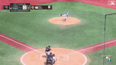 Max Acosta clubs a home run to left field