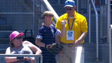 Fan makes great grab, runs off with foul ball