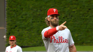 Bryce Harper plays a game of rock, paper, scissors