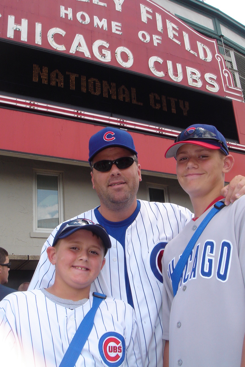 Carson Kelly (right) with his dad Mike (center) and little brother Parker (left)